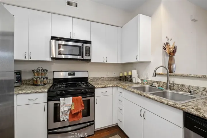 Granite Counters, white cabinets, and more!!!