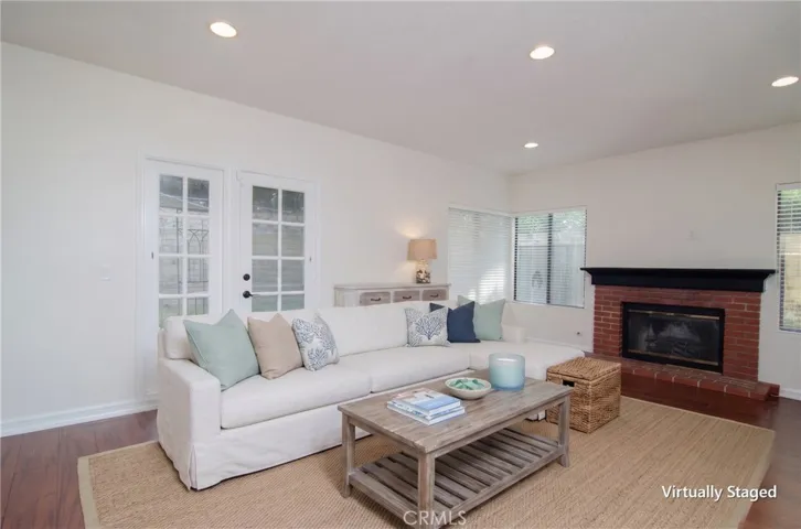 Family area and fireplace - virtually staged