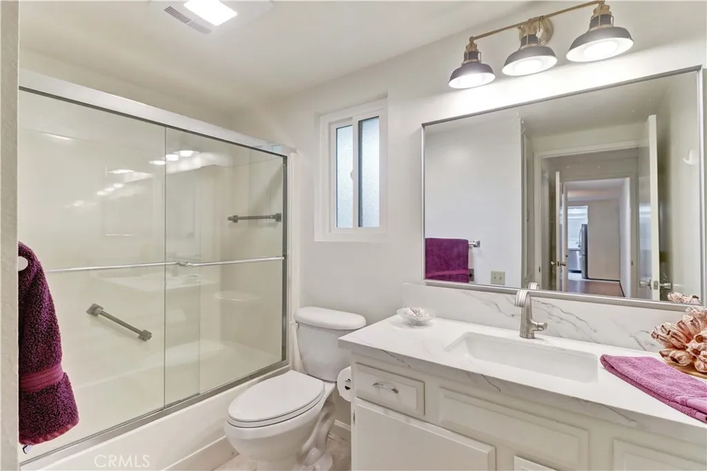 PRIMARY BATHROOM with WINDOW