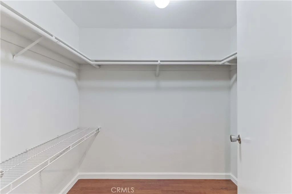 PRIMARY BEDROOM WALK-IN CLOSET