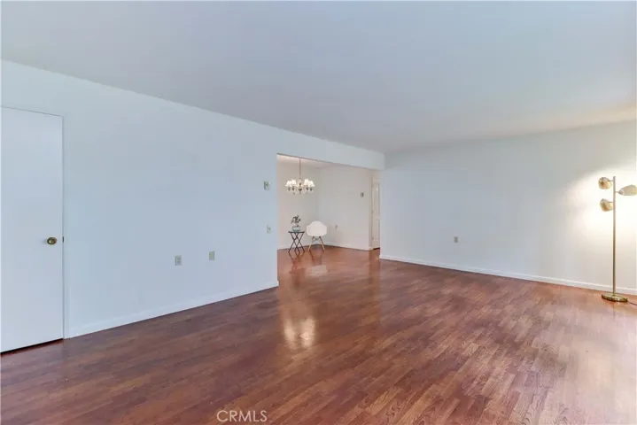 FRONT DOOR INTO LIVING ROOM & DINING AREA