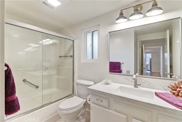 PRIMARY BATHROOM with WINDOW
