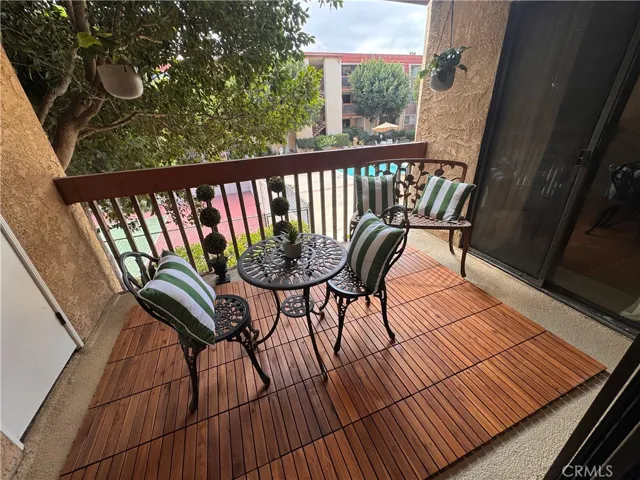 Balcony is off of Living room and Primary bedroom.