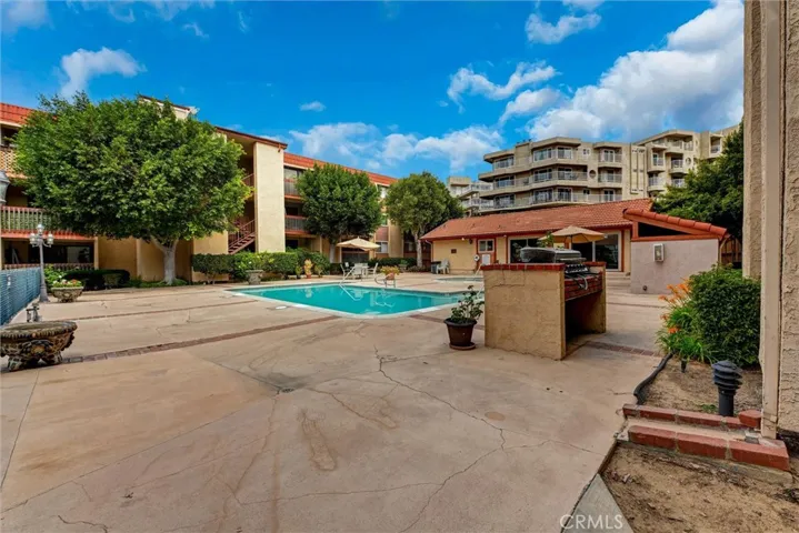 Pool with grill for those hot summer days.