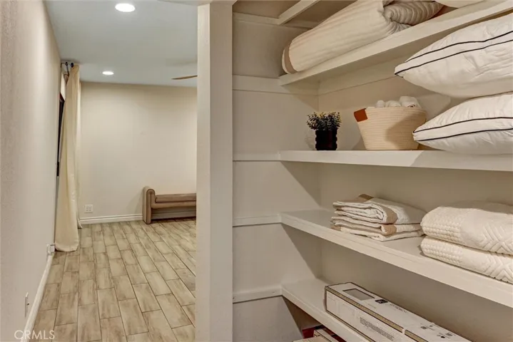 Primary bedroom closet 1- perfect for jeans and sweaters or linens.