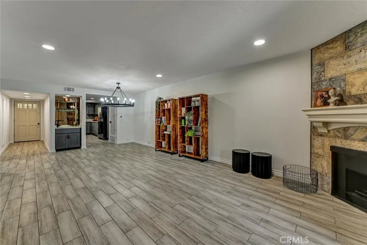 Spacious living room with recessed lighting.