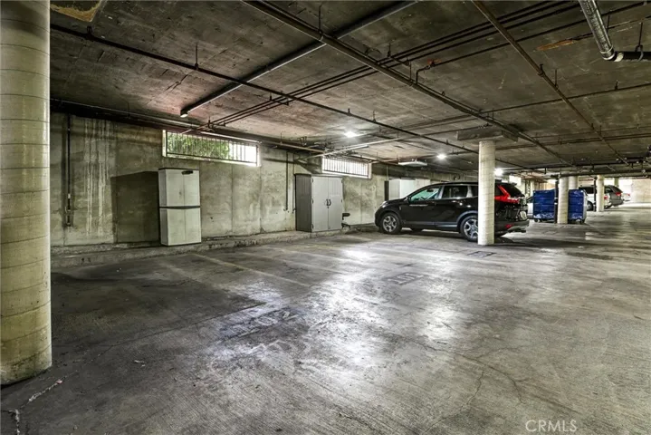 Parking spots 101 and 102 with storage unit.
