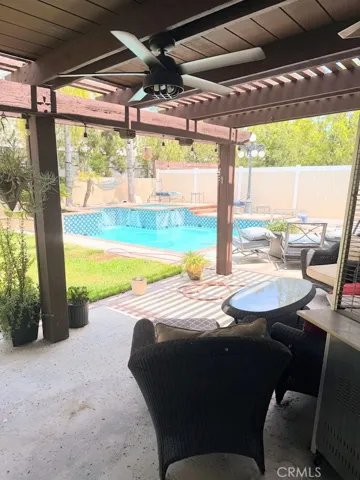 Covered patio, pool, spa and waterfall