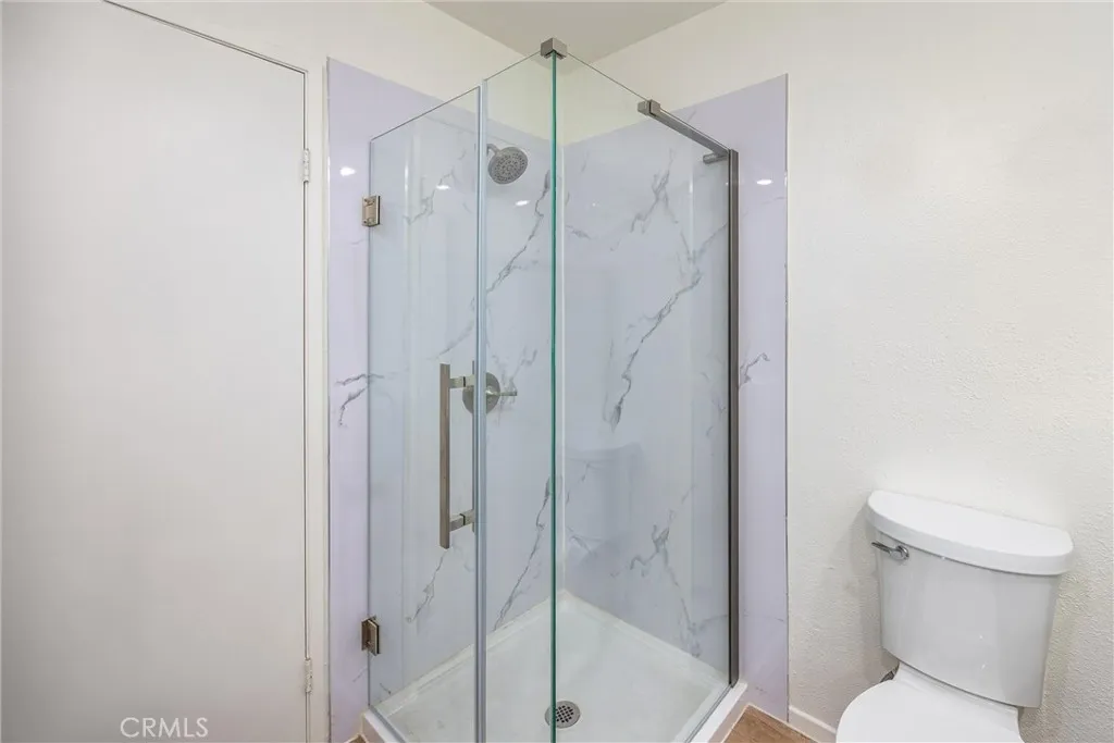 Beautifully remodeled walk-in shower with contemporary finishes