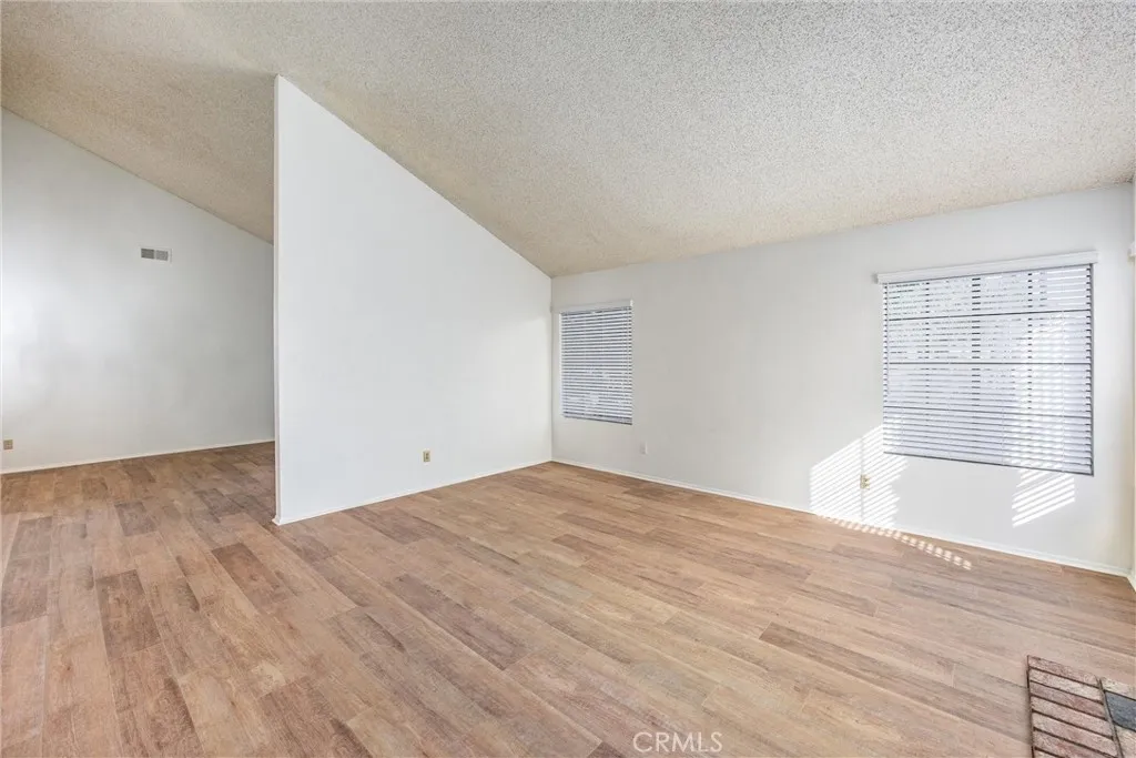 Bright living room with vaulted ceilings