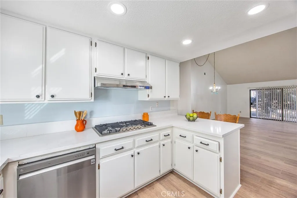 Kitchen with generous cabinet storage and plenty of counter space