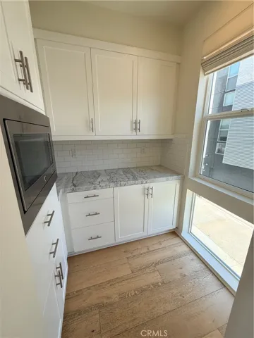 Butler's Pantry with microwave, storage and ample counters