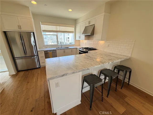 Kitchen Counter Island w/ three barstools