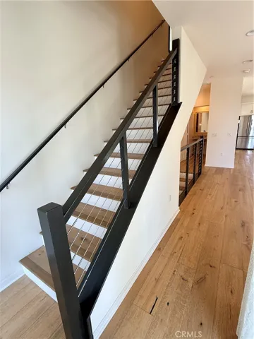 Second floor stairs going up to third floor