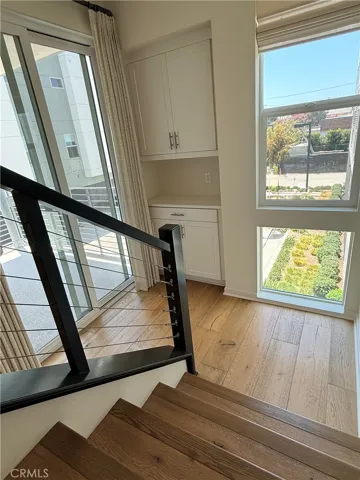stairs down to second floor and storage
