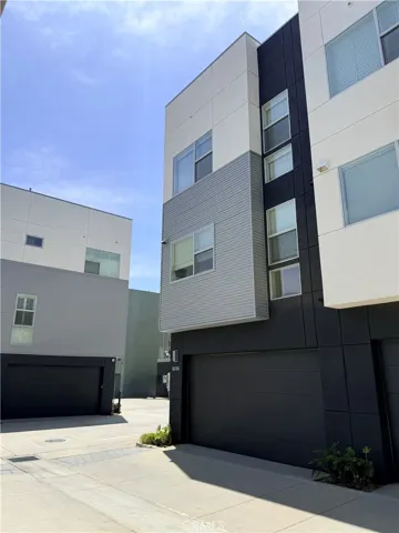 Back of home with garage
