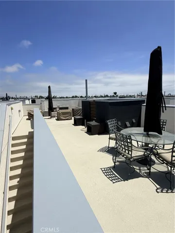 Rooftop Deck w/ furniture and stairs