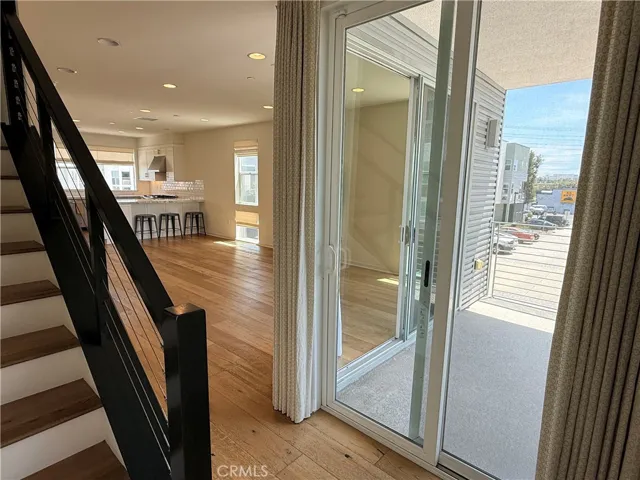 second floor stair landing out to patio