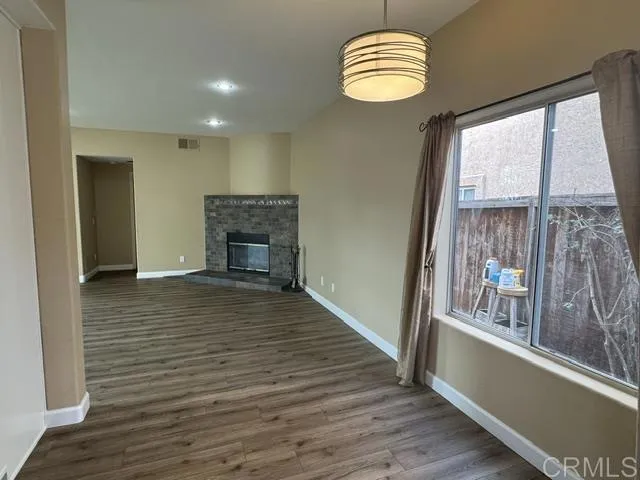Looking to dining room with gas fireplace