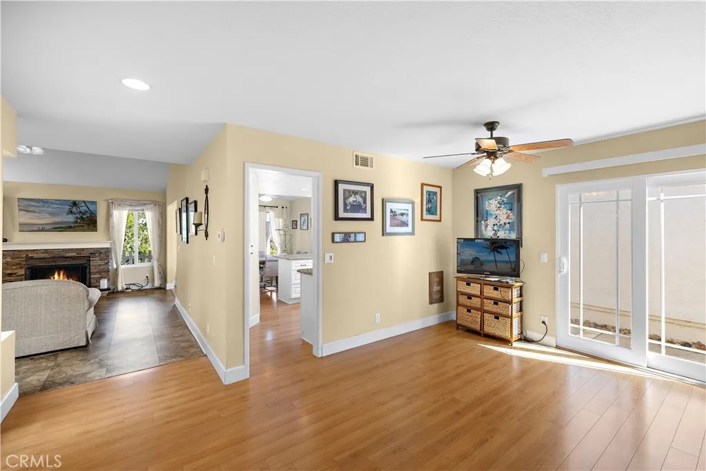Formal dining room with a slider to the side yard