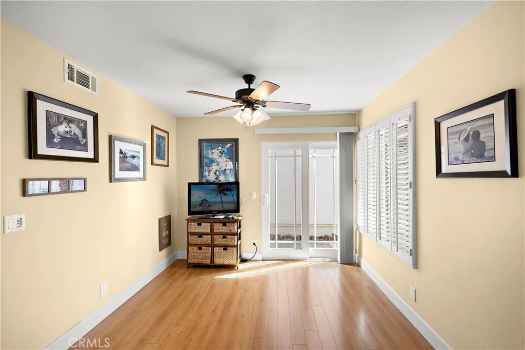 Formal dining room with a slider to the side yard