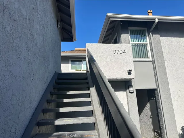Stairs to entry/patio balcony