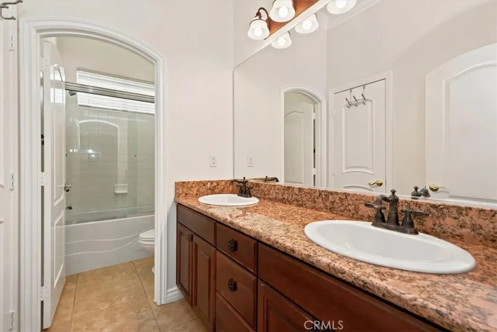 Hallway Bathroom with Dual Sinks
