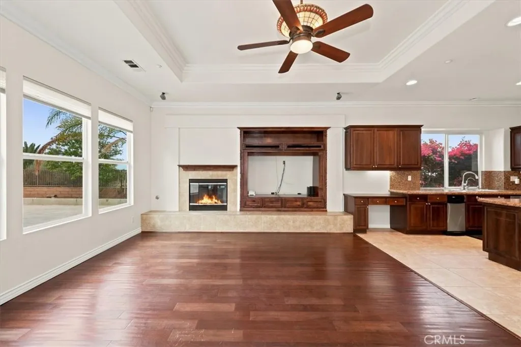 Tiled fireplace and Built-in Entertainment Center