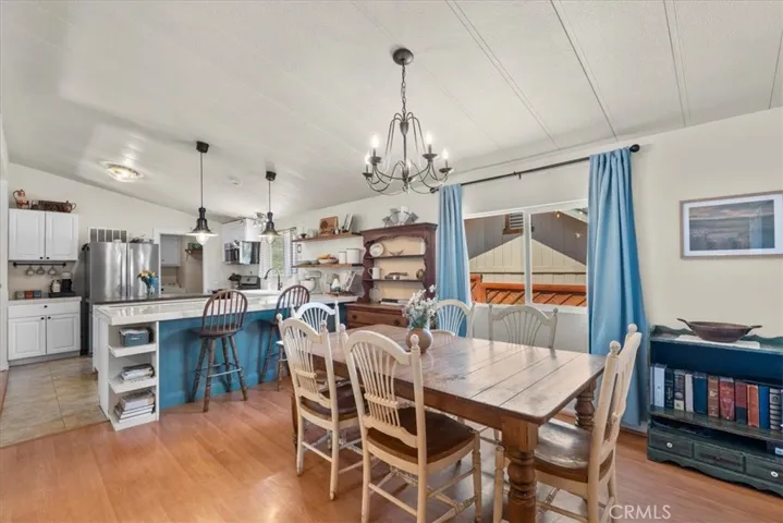 Lovely dining area with pretty chandelier.