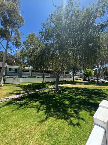 Open grassy area behind the unit.