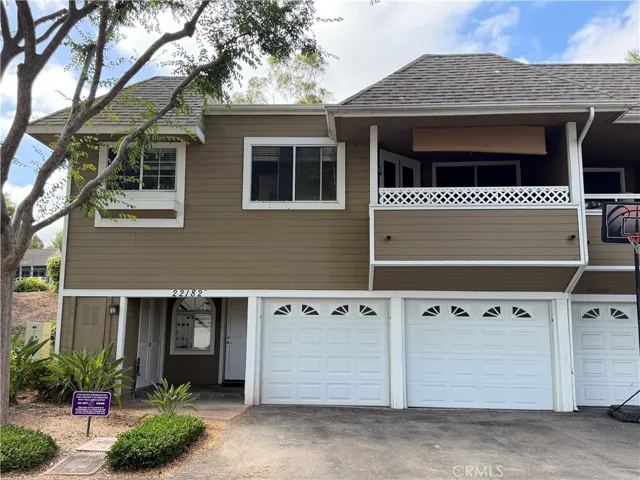 End Unit : 2 car garage (2 single doors) : large covered balcony area.