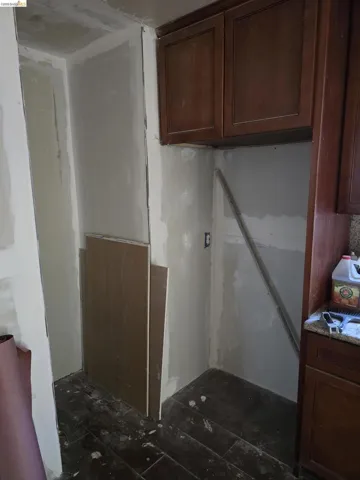 Cherry-finish cabinetry with recessed panel doors