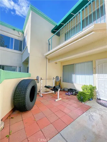 Patio with balcony from main bedroom