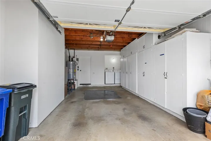 Spacious Garage with Full sized Laundry AND Storage