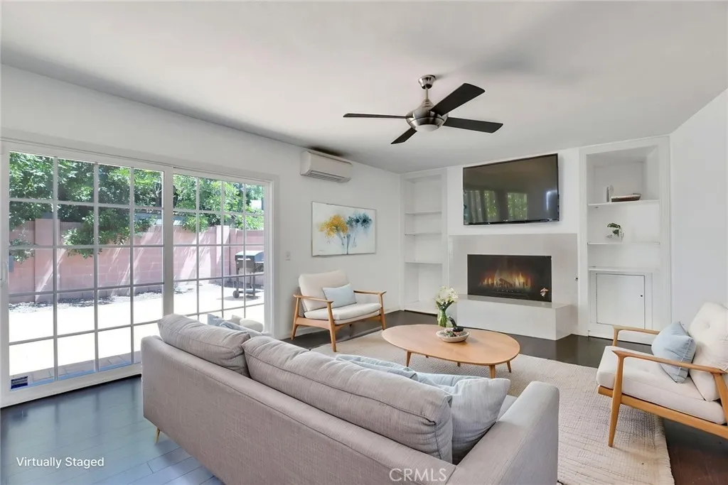 Virtually staged; Virtual fire; fireplace does not have a gas line