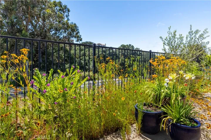 Lovely gardens. Home backs up to greenbelt.