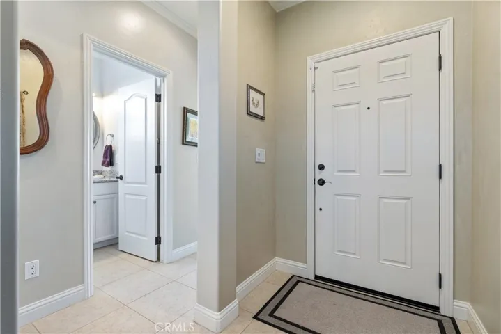 Front Entry. The hallway to the left leads to the 2 guest bedrooms and full bath.