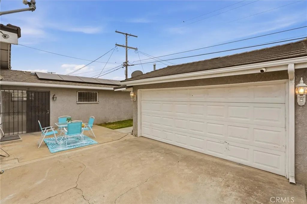 Exterior entracnce into 4th Bed/ADU plus 2 car garage with electric car charger.