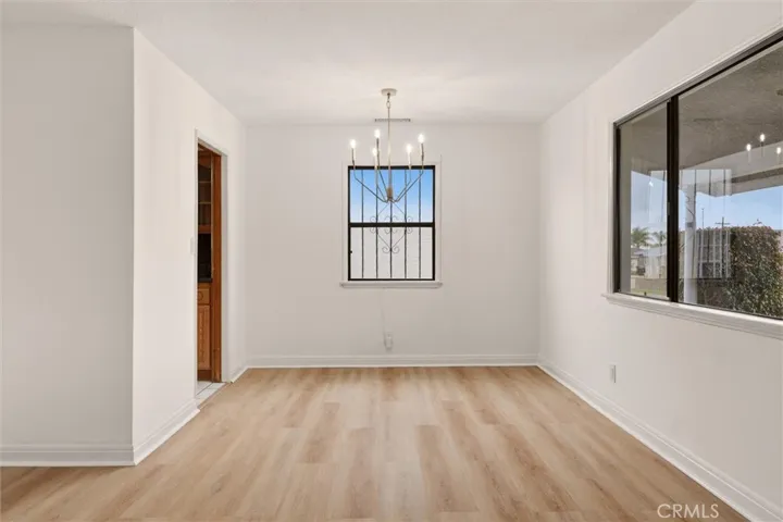 Dining area with chandelier.