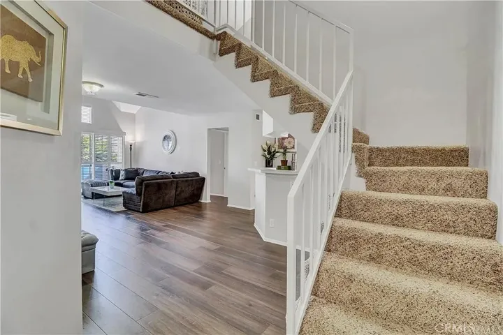 Entry view to Stairwell to 3rd Bedroom & Living Rm