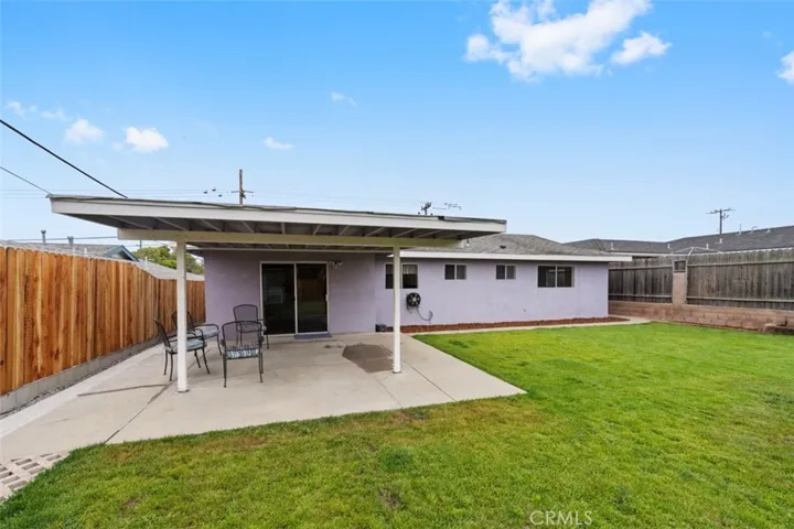Huge backyard with a covered patio and plenty of room to play!