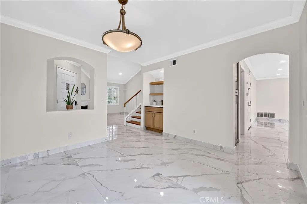 Dining Room facing entry and wet bar area