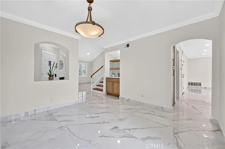 Dining Room facing entry and wet bar area