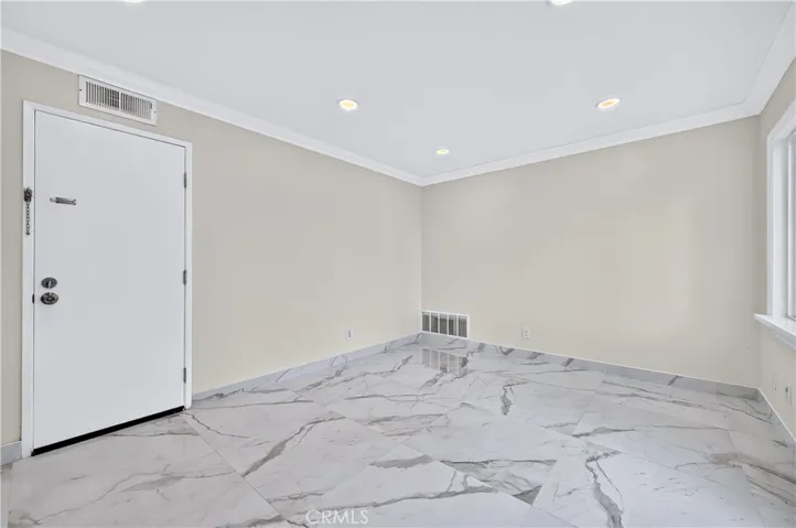 Family room with door to the garage