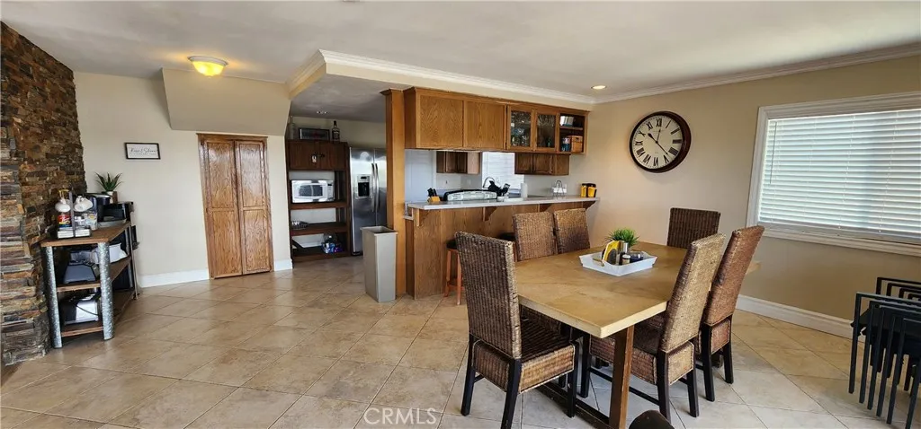 Dining area facing toward the coffee bar and kitchen