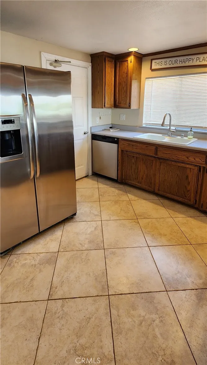 Kitchen has direct access to the garage