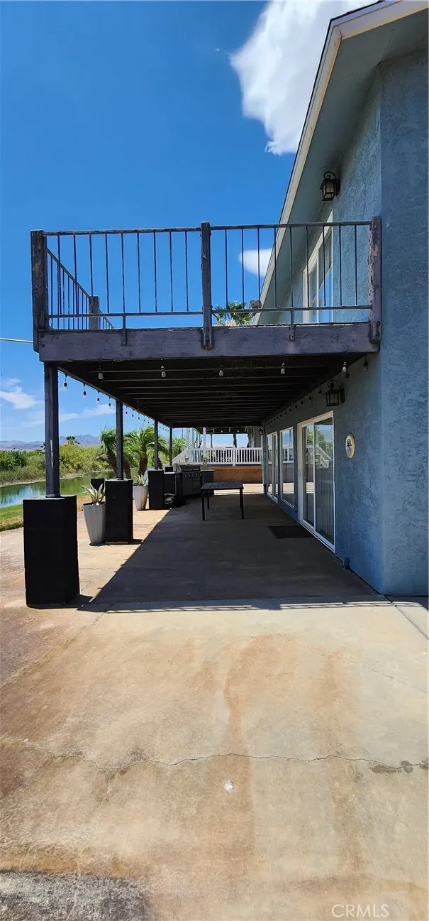 Multiple sliders provide direct access to the patio and back yard