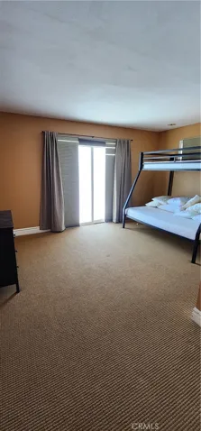 Bedroom 3 has slider to upstairs balcony