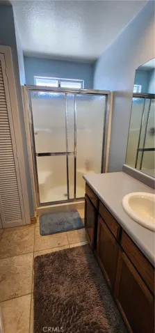 Primary bathroom has walk-in shower
