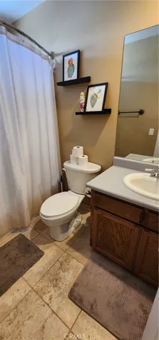 Upstairs guest bathroom has tub/shower combo
